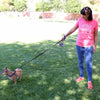 Woman walking dog at the park holding Tre Ponti Mesh Leash in Lavender connected to French Bulldog wearing Tre Ponti Mesh Adjustable Harness in Lavender 