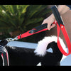 Person's hand holding second handle and showing shortened length of Tre Ponti Double Handle Long Leash in Red